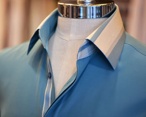A blue striped detailed collar and front placket Anto shirt, showcased on a mannequin.