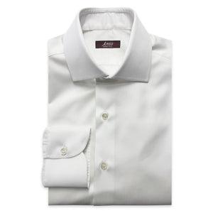 Folded white textured dress shirt