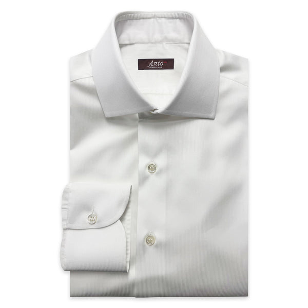 Folded white textured dress shirt