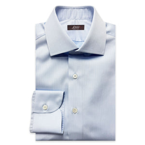 Folded light blue textured dress shirt