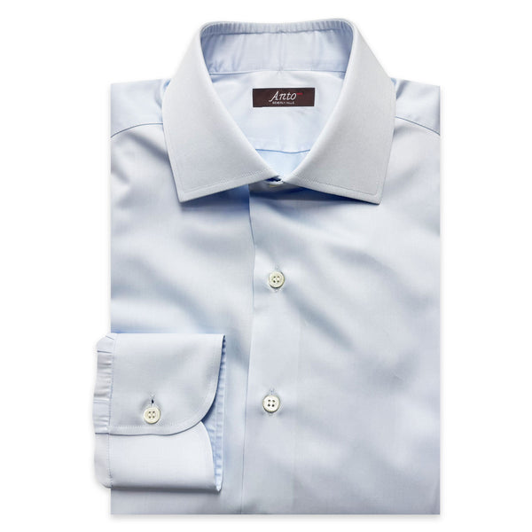 Folded light blue dress shirt