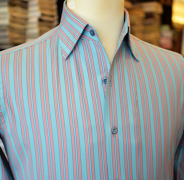 Light blue shirt with pink stripes on a mannequin. 