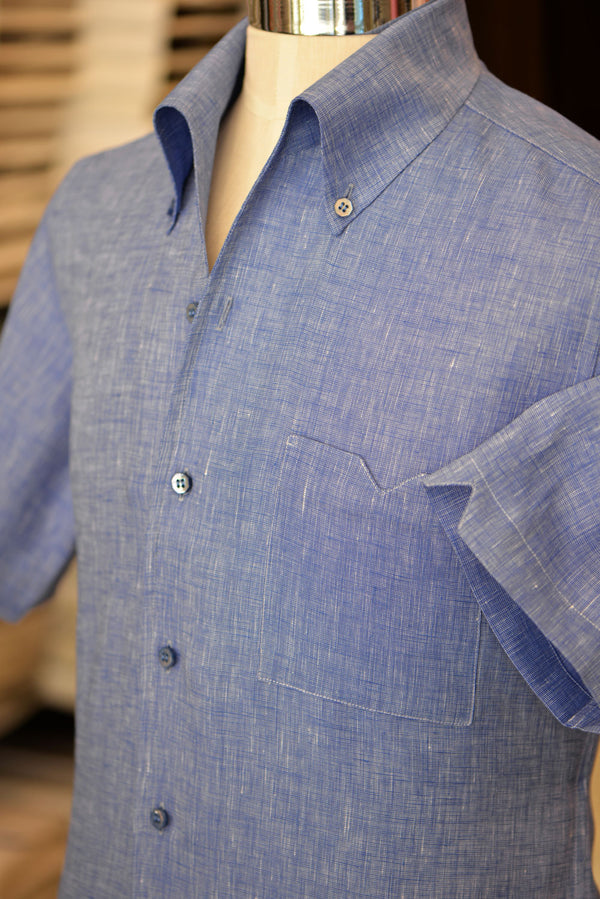 Blue linen shirt on a mannequin.