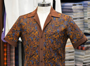 A short sleeve brown patterned Anto camp collar shirt, showcased on a mannequin.