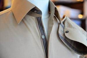 Anto brown sport shirt featuring brown stripe detailed fabric, displayed on a mannequin.