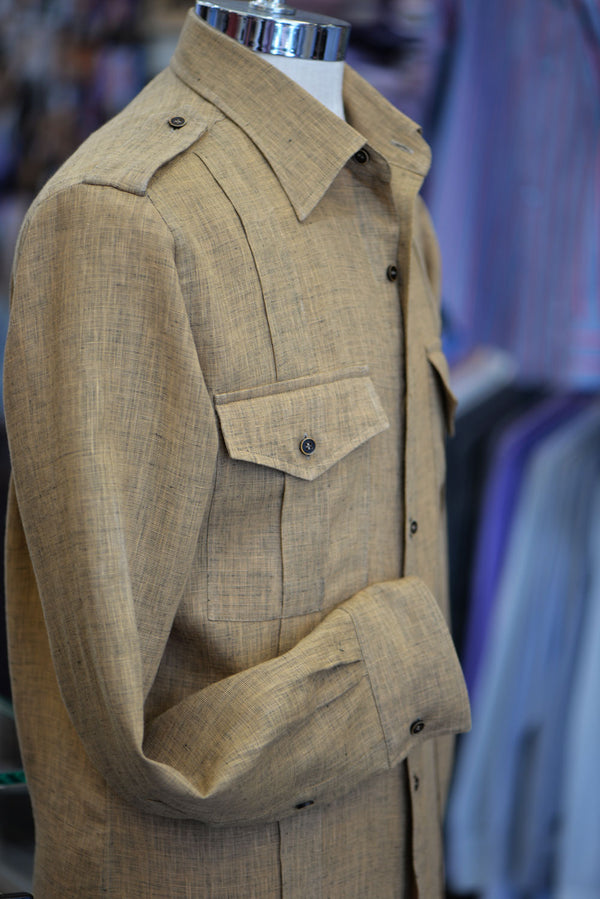 Brown safari shirt on a mannequin.