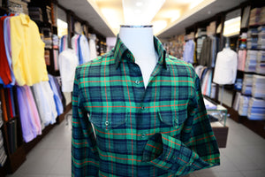 Green check sport shirt on a mannequin