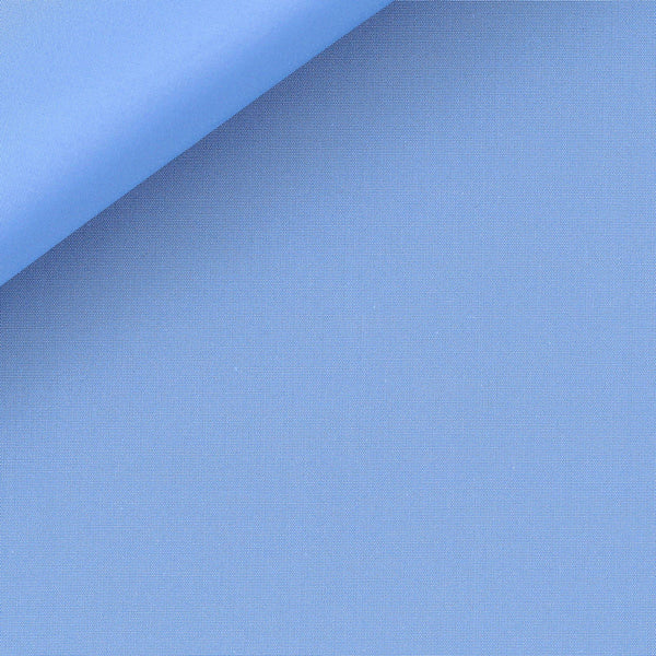Close-up view of an Anto blue poplin fabric swatch, highlighting its fine texture and quality.