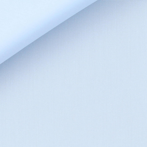 Close-up view of an Anto light blue poplin fabric swatch, highlighting its fine texture and quality.