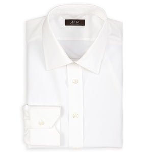 Anto white dress shirt, neatly folded, showcasing the fabric's smooth texture and elegant design.